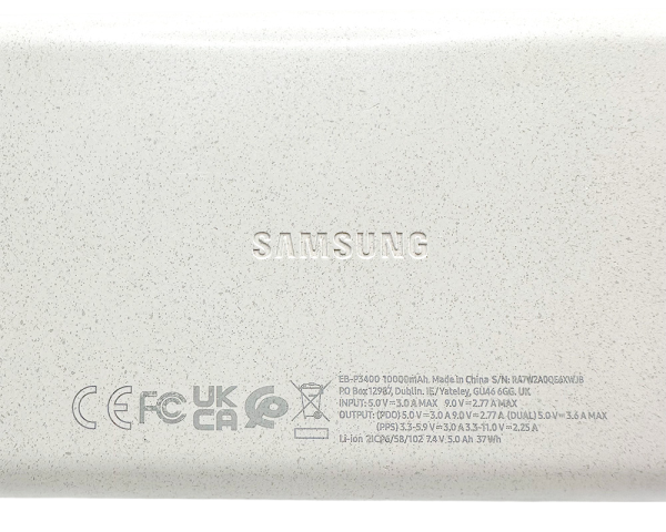 Samsung power bank portable power, white finish, brand logo and technical details visible on battery pack surface.