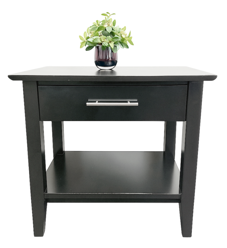 Mesita de noche negra Sutton con cajón y planta decorativa, ideal para dormitorio moderno.