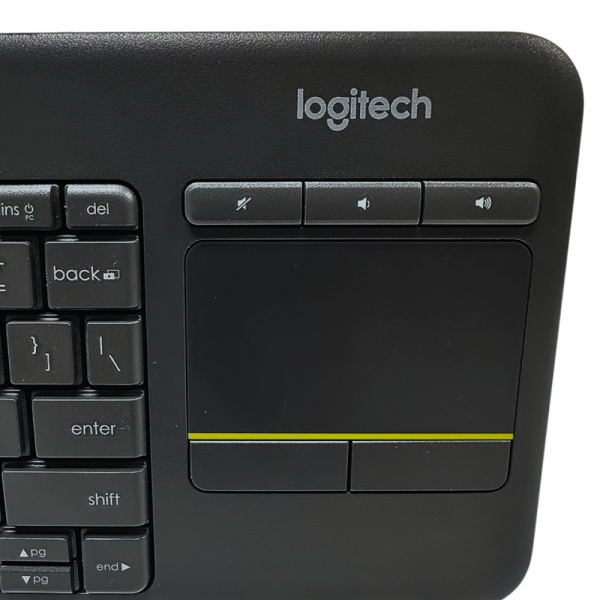 Logitech K400 wireless keyboard with touchpad mouse and dedicated media buttons, close-up view.