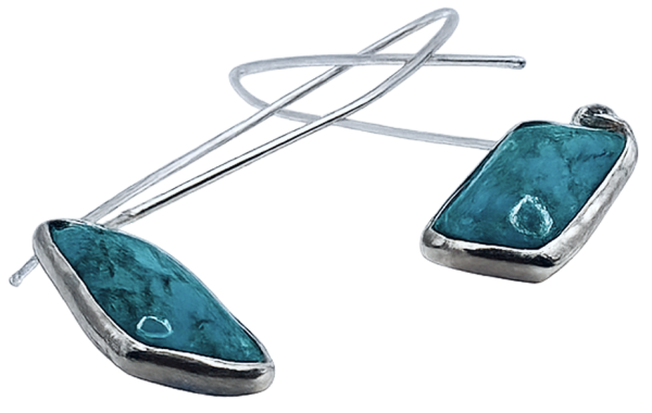 Pair of silver drop earrings with turquoise stones, featuring sleek hooks and a modern geometric design.