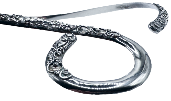 Silver loop open collar necklace for a woman with intricate engraved detailing, elegant and modern jewelry design.