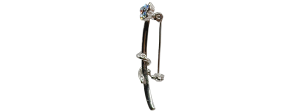 Elegant floral crystal brooch pin with silver vine design, perfect for accessorizing jackets or bags.