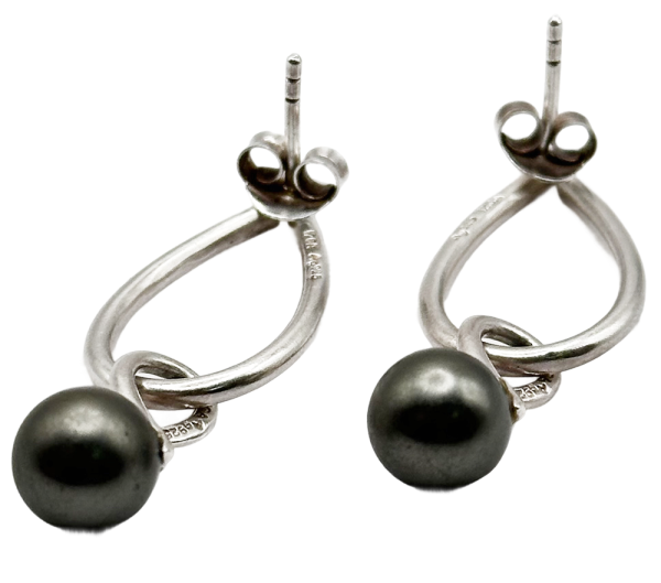 Silver drop earrings with a modern knot design and round beads, perfect for adding elegance to any jewelry collection.