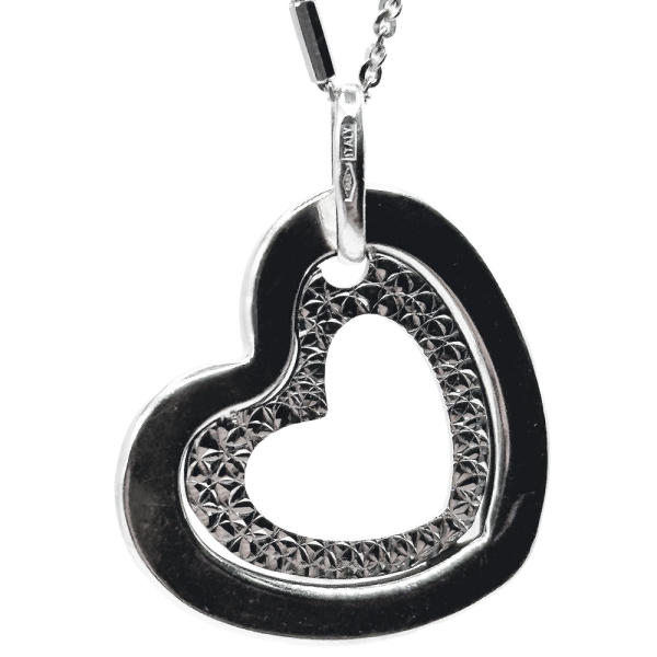 Heart-shaped gold pendant necklace with intricate inner detailing, perfect for elegant and timeless looks.